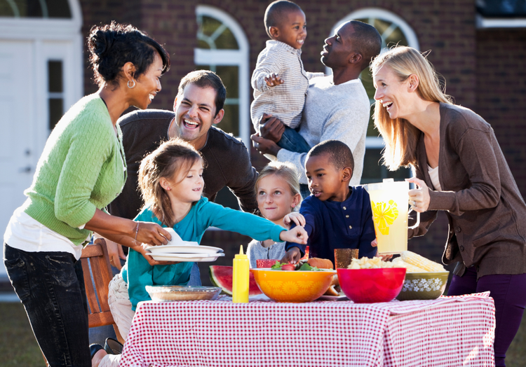 Image of neighbors interacting at a community event